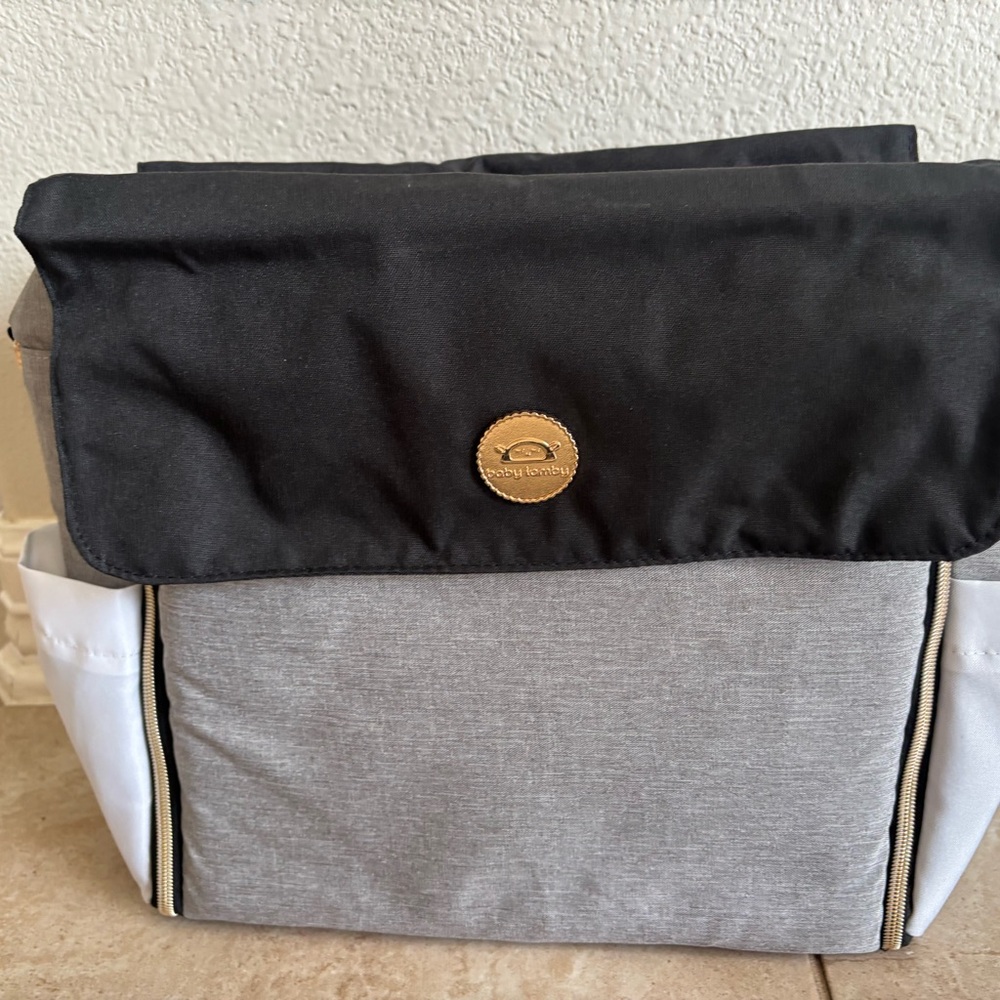 Baby Lamby Essential
Diaper Bag with Changing Pad
